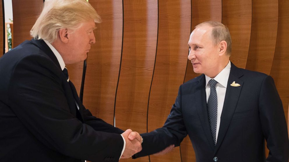 PHOTO: In this photo provided by German government President Donald Trump shakes hands with Russian President Vladimir Putin before the first working session of the G-20 summit in Hamburg, northern Germany, July 7, 2017.