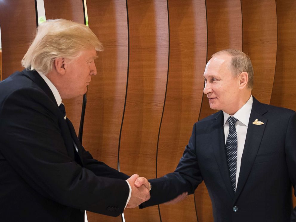 PHOTO: In this photo provided by German government President Donald Trump shakes hands with Russian President Vladimir Putin before the first working session of the G-20 summit in Hamburg, northern Germany, July 7, 2017.