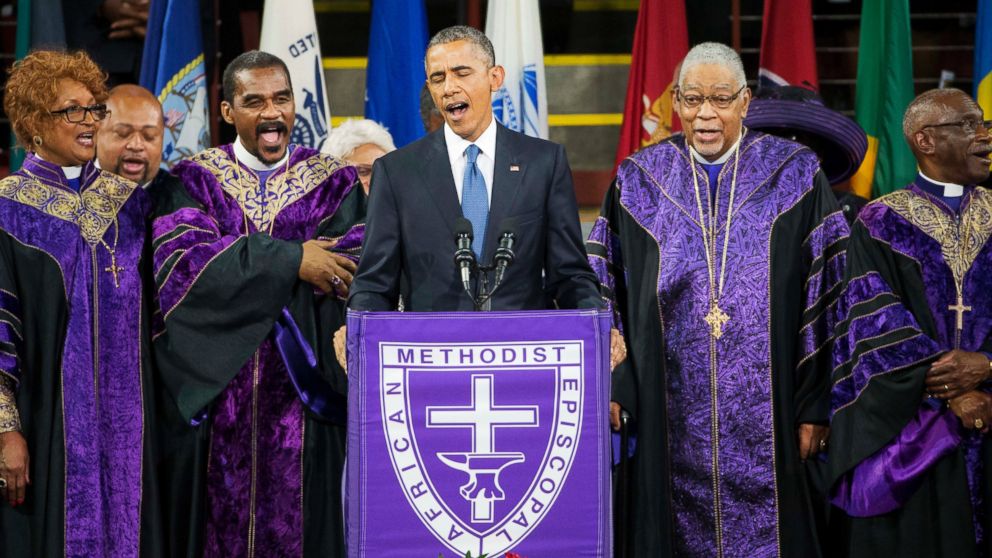 President Barack Obama sings "Amazing Grace" during services honoring the life of Rev. Clementa Pinckney, June 26, 2015, at the College of Charleston TD Arena in Charleston, S.C.