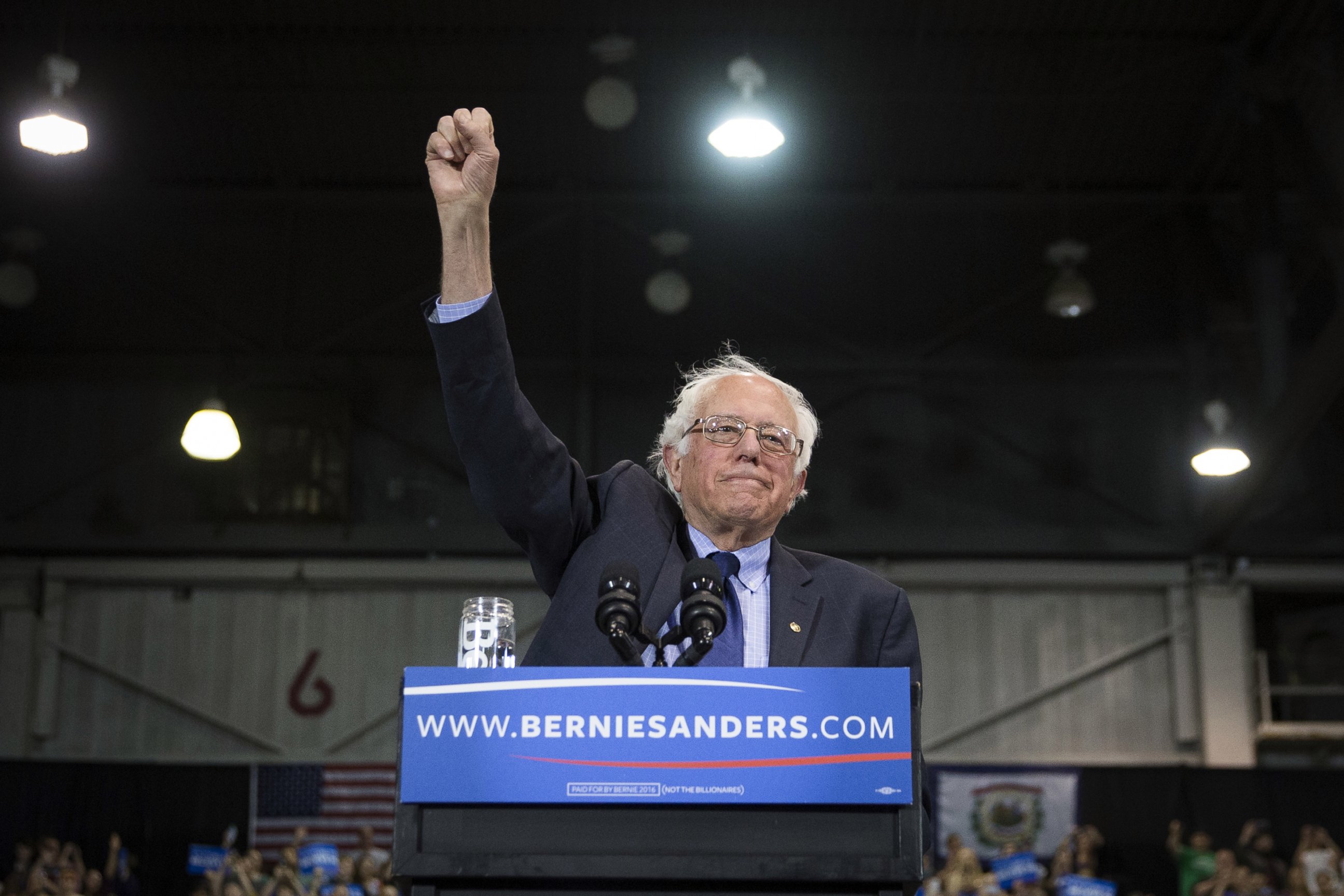 PHOTO: Democratic presidential candidate Sen. Bernie Sanders raises his fist to acknowledge the crowd before he speaks during an election night campaign event at the Big Sandy Superstore Arena on April 26, 2016, in Huntington, W.Va.