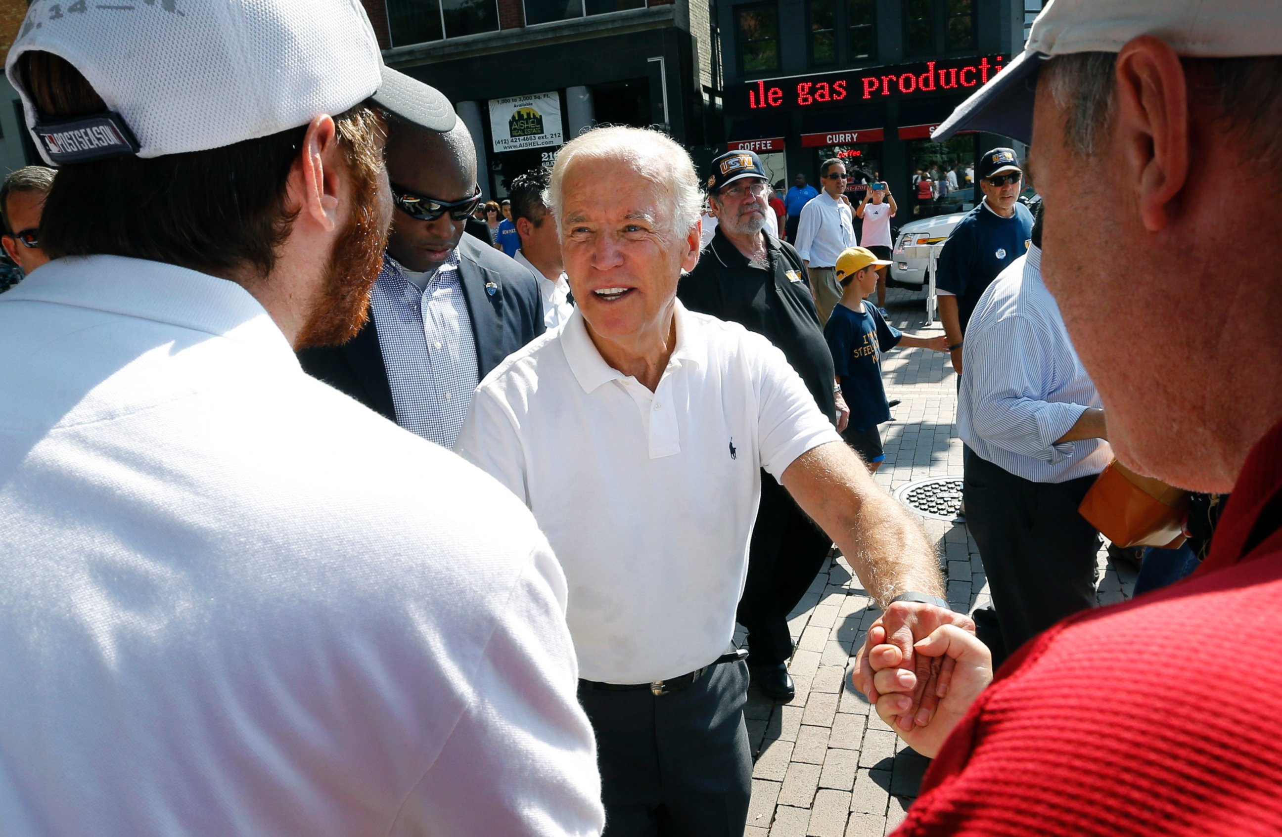 PHOTO: Vice President Joe Biden, center, greets some of the crowd as he walks in the annual Labor Day parade on Sept. 7, 2015, in Pittsburgh.