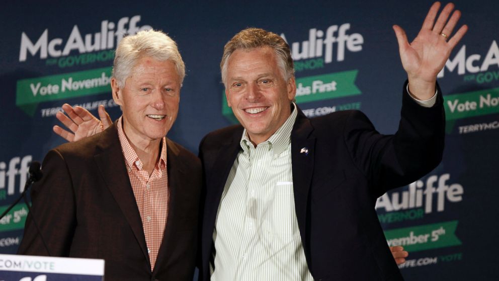 PHOTO: Former President Bill Clinton, left, and Democratic gubernatorial candidate Terry McAuliffe visit the Virginia Tech campus in Blacksburg Va., Oct. 28 2013.
