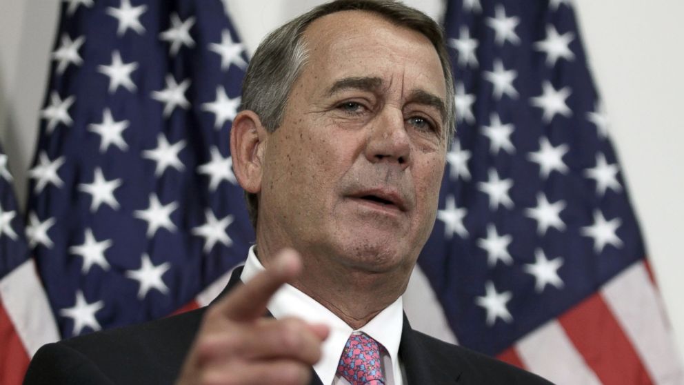 Outgoing House Speaker John Boehner of Ohio talks with reporters on Capitol Hill in Washington, Oct. 27, 2015.