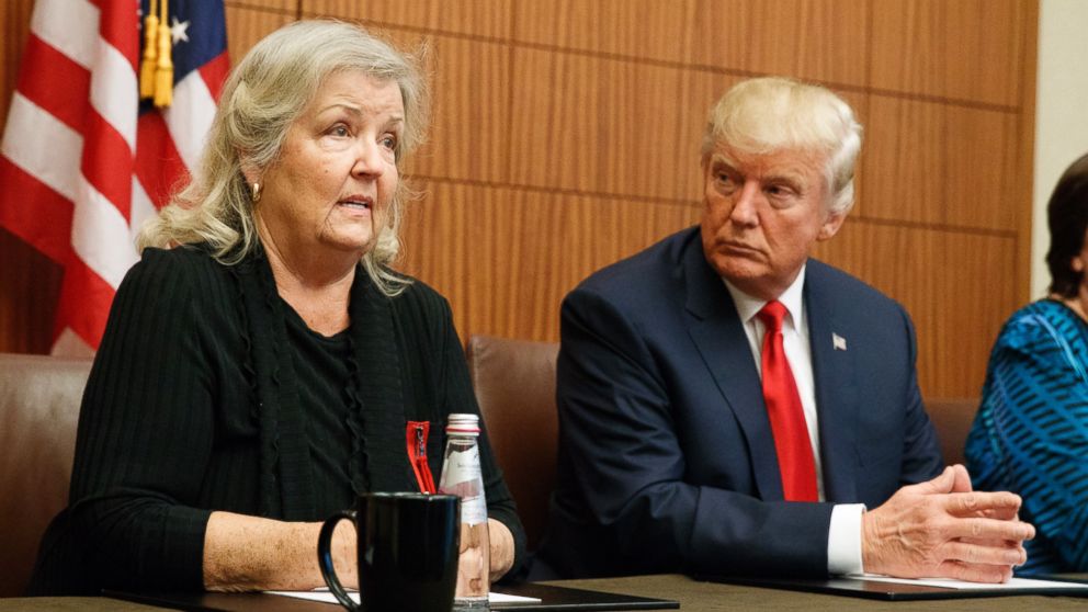 PHOTO: Republican presidential candidate Donald Trump listens as Juanita Broaddrick, who has accused former President Bill Clinton of sexual assault, speaks before the second presidential debate, Oct. 9, 2016, in St. Louis. 