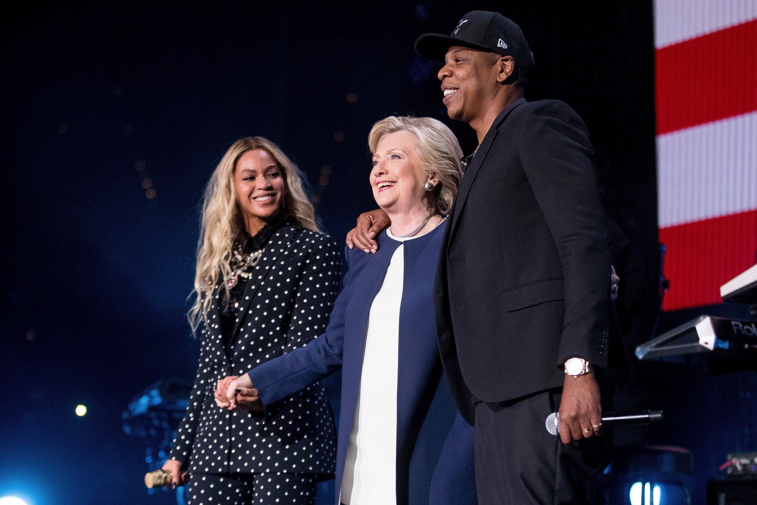 PHOTO: Democratic presidential candidate Hillary Clinton, center, appears on stage with artists Jay Z, right, and Beyonce, left, during a free concert at at the Wolstein Center in Cleveland, Friday, Nov. 4, 2016. 