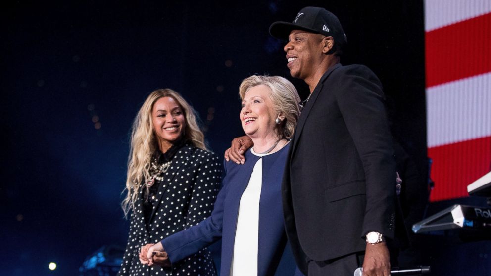 PHOTO: Democratic presidential candidate Hillary Clinton, center, appears on stage with artists Jay Z, right, and Beyonce, left, during a free concert at at the Wolstein Center in Cleveland, Friday, Nov. 4, 2016. 