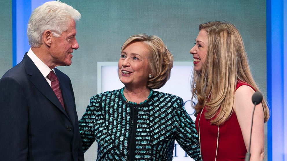 PHOTO: Former President Bill Clinton takes the stage with Hillary Rodham Clinton and Chelsea Clinton at the Clinton Global Initiative, Sept. 24, 2013 in New York.