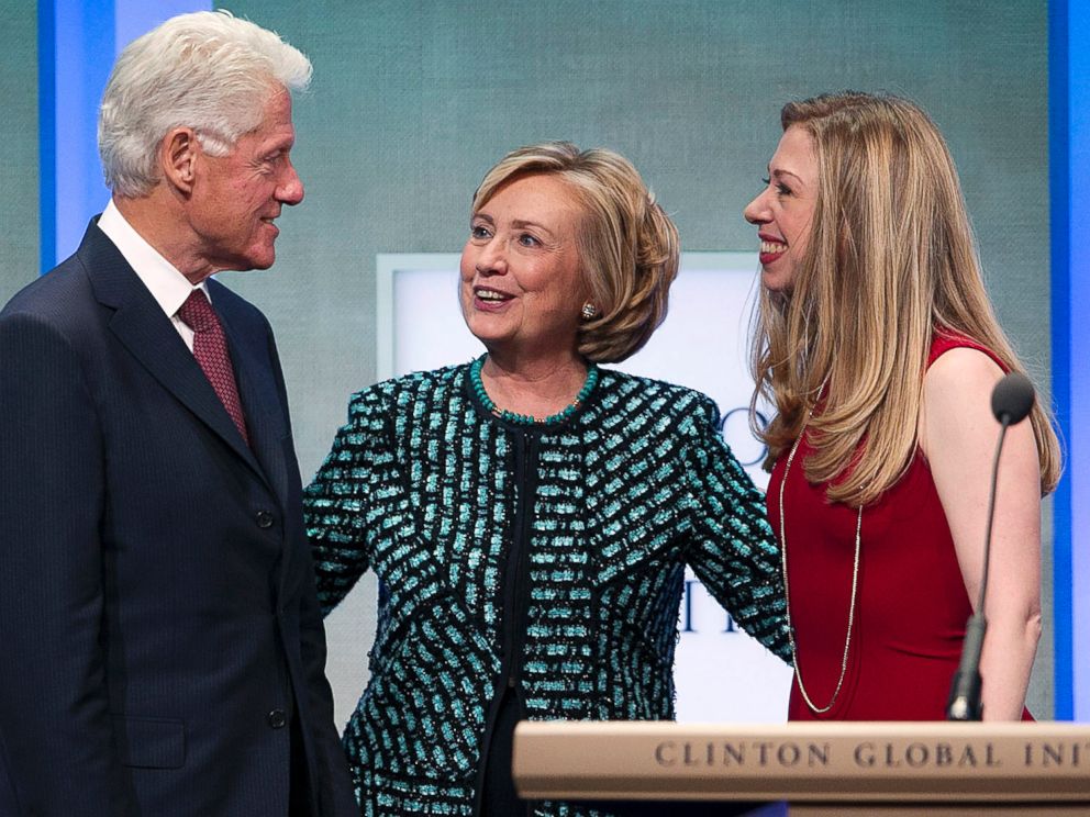 PHOTO: Former President Bill Clinton takes the stage with Hillary Rodham Clinton and Chelsea Clinton at the Clinton Global Initiative, Sept. 24, 2013 in New York.