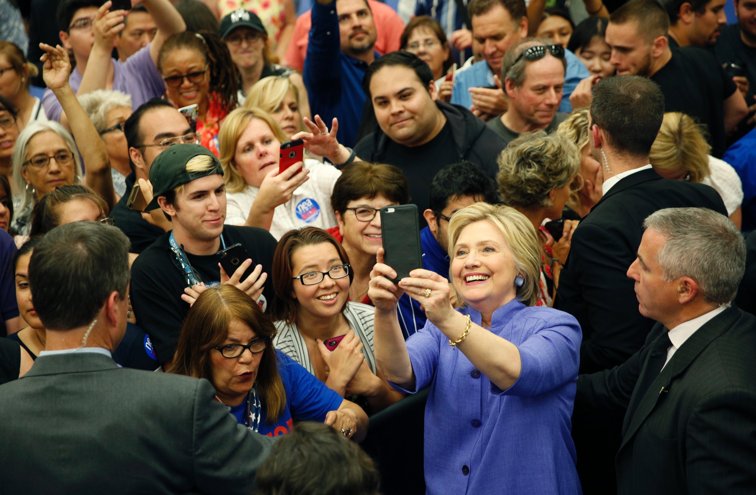 PHOTO: Hillary Clinton takes a selfie with supporters at a rally at California State University, San Bernardino, in San Bernardino, California, June 3, 2016.