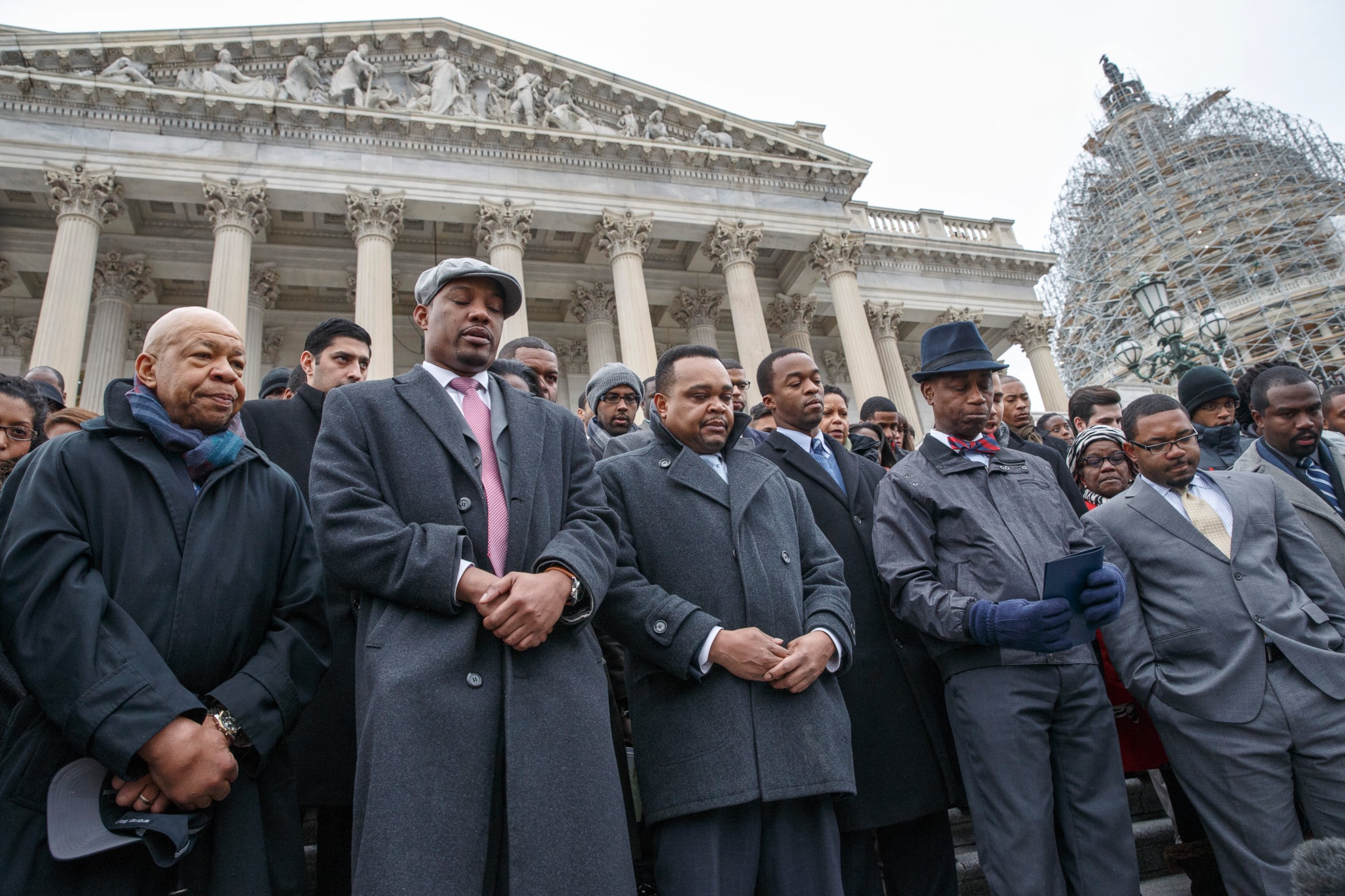 PHOTO: Congressional staff members, joined by Rep. Elijah Cummings, gather on Capitol Hill in Washington on Dec. 11, 2014.