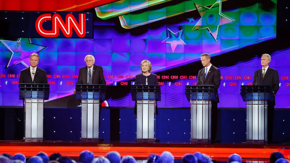 Democratic presidential candidates from left, former Virginia Sen. Jim Webb, Sen. Bernie Sanders, of Vermont, Hillary Rodham Clinton, former Maryland Gov. Martin O'Malley, and former Rhode Island Gov. Lincoln Chafee take the stage before the CNN Democratic presidential debate, Oct. 13, 2015, in Las Vegas.