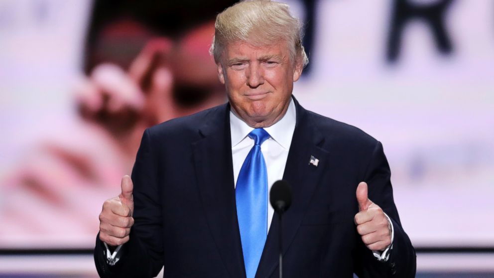 Republican Presidential Candidate Donald Trump flash two thumbs up as he introduces his wife Melania during the opening day of the Republican National Convention in Cleveland, July 18, 2016.