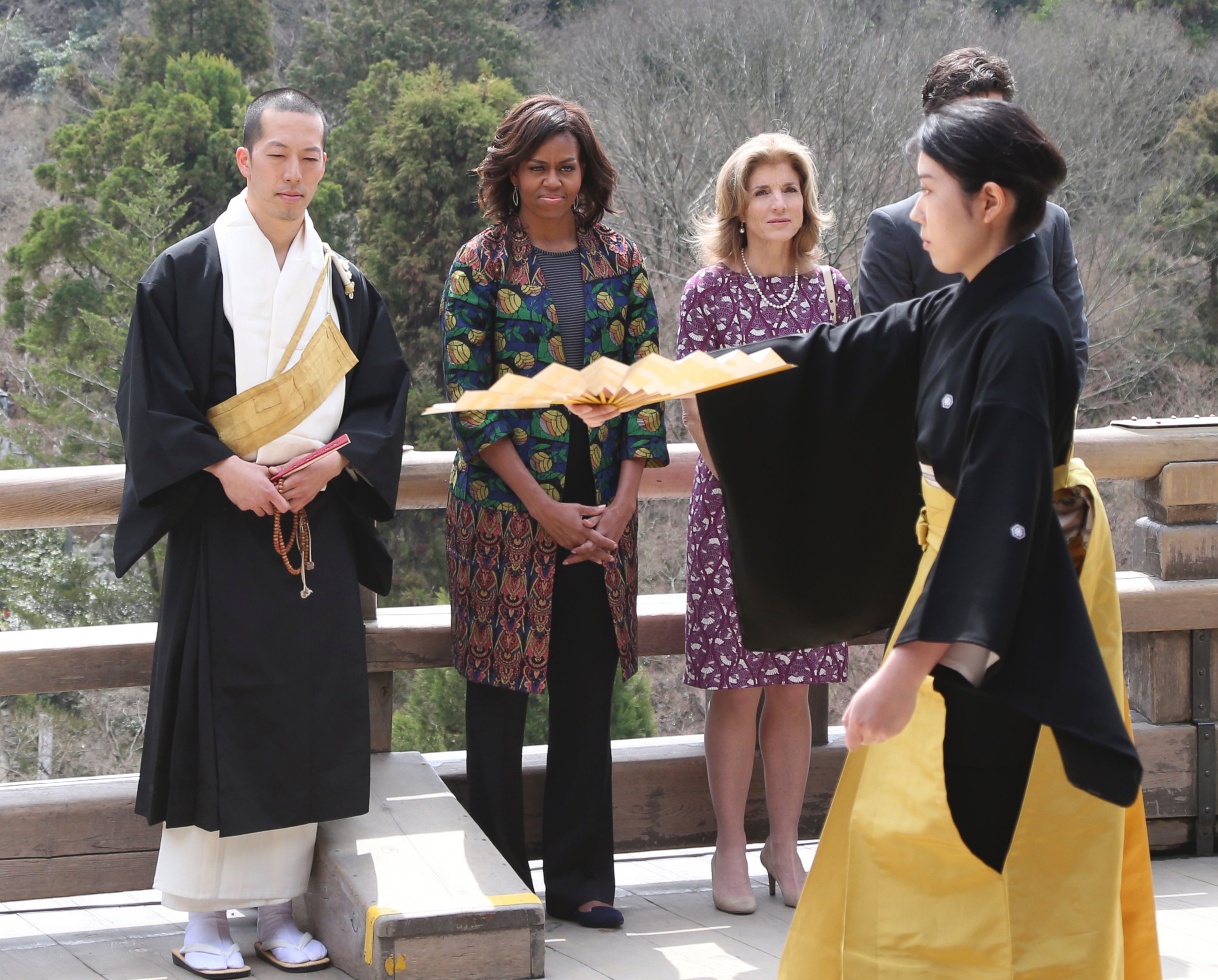 PHOTO: First lady Michelle Obama watches a Noh performance by college students, with monk of Kiyomizu-dera Buddhist temple Eigen Onishi, left, and U.S. Ambassador to Japan Caroline Kennedy, second from right, at the temple in Kyoto, Japan, March 20, 2015.