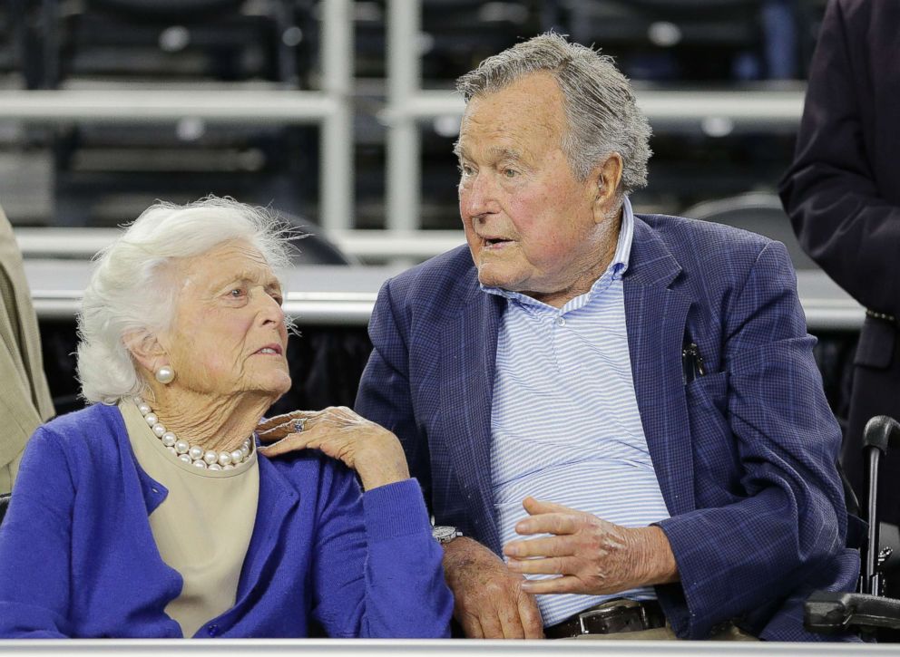 PHOTO: In this March 29, 2015, file photo, former President George H.W. Bush and his wife Barbara Bush speak before a college basketball regional final game between Gonzaga and Duke, in the NCAA basketball tournament in Houston.