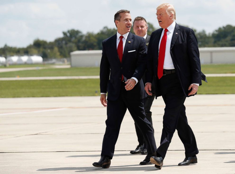 PHOTO: Missouri Gov. Eric Greitens, left, walks with President Donald Trump as they arrive in Springfield, Mo., Wednesday, Aug. 30, 2017.