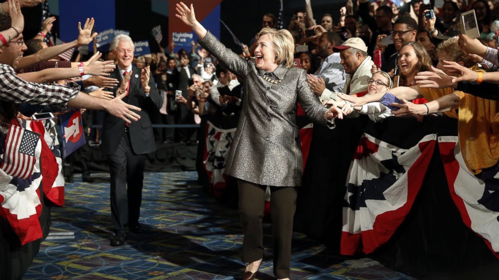 PHOTO: Democratic presidential candidate Hillary Clinton accompanied by former President Bill Clinton walks to stage at her presidential primary election night rally in Philadelphia on April 26, 2016.