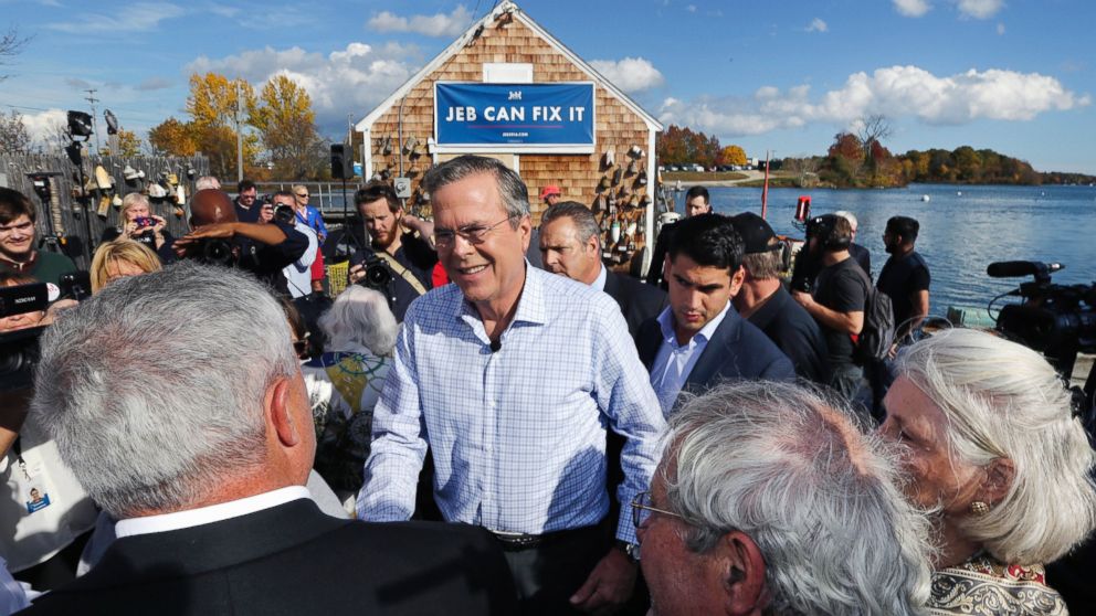 Republican presidential candidate, former Florida Gov. Jeb Bush shakes hands with supporters during a campaign stop outside Geno's Chowder and Sandwich Shop in Portsmouth, N.H., Oct. 29, 2015.