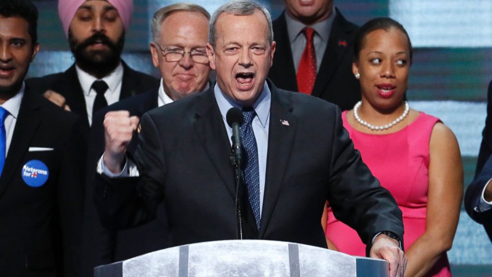 Gen. John Allen stands with veterans as he speaks during the final day of the Democratic National Convention in Philadelphia, July 28, 2016.