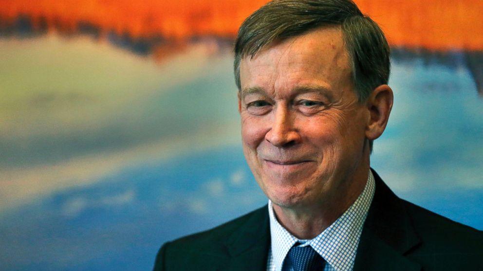 PHOTO: Colorado Gov. John Hickenlooper smiles while speaking to members of the media during a news conference inside his office at the state Capitol, in Denver, May 7, 2015.