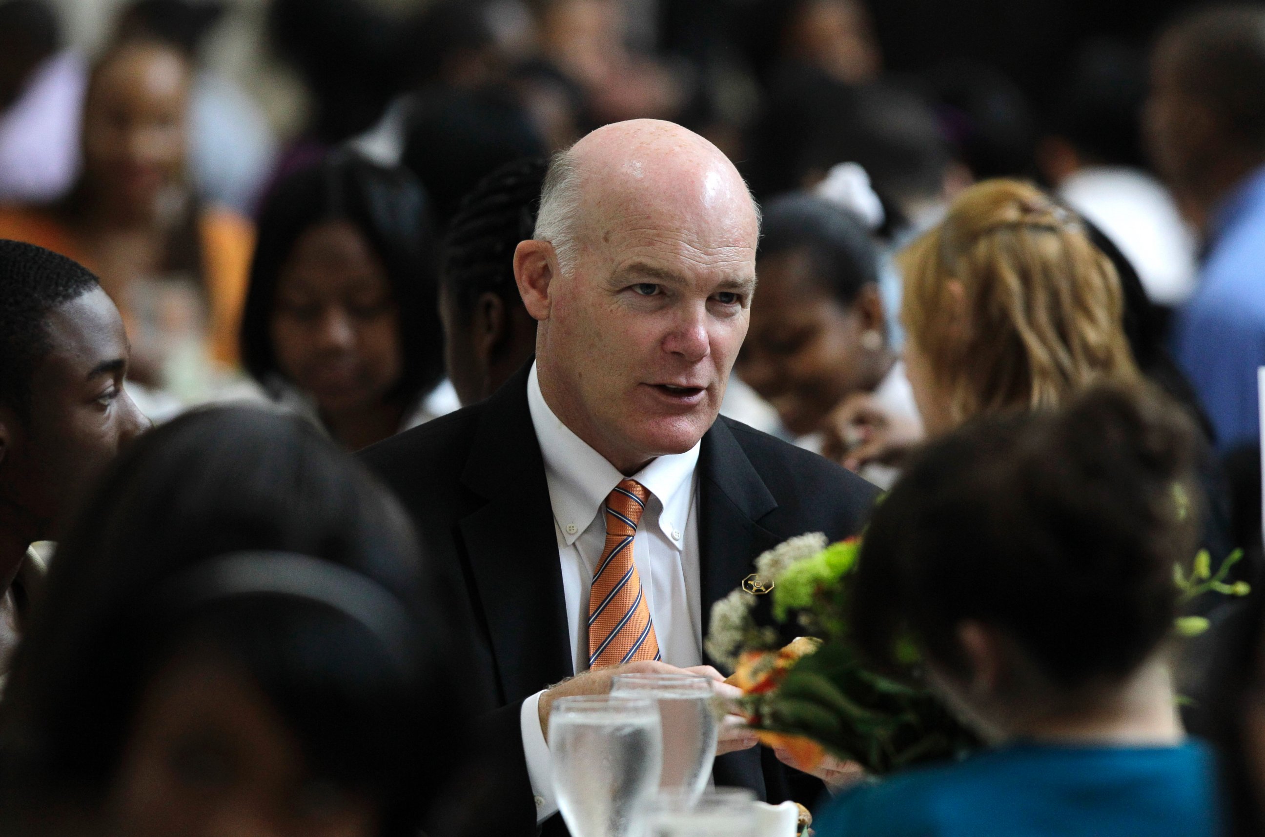 PHOTO: Joe Clancy, Special Agent in Charge, Presidential Protective Division, United States Secret Service talks with students at a White House youth leadership and mentoring luncheon at the Detroit Institute of Arts in Detroit, May 26, 2010.   