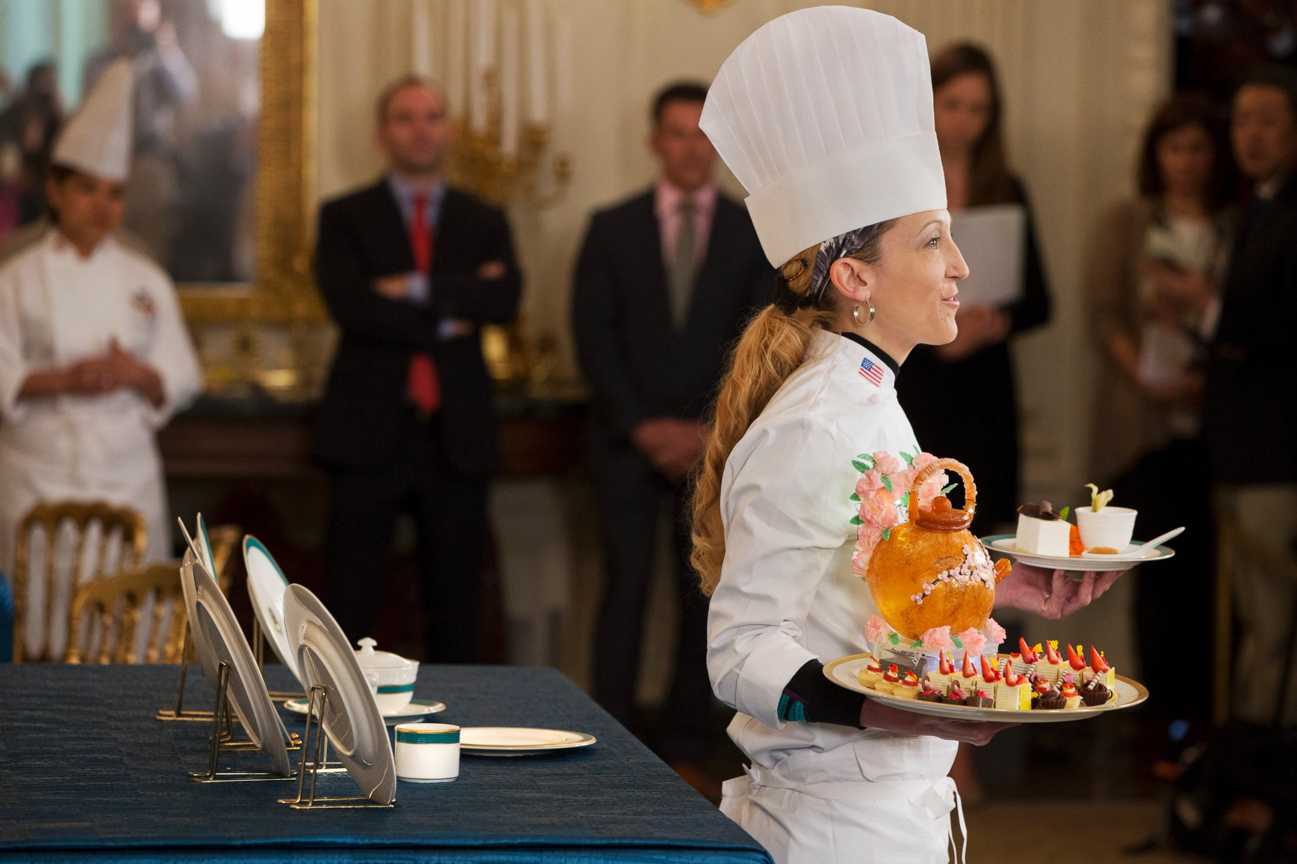 PHOTO: White House pastry chef Susan Morrison holds up desserts for Tuesday's State Dinner hosted by President Barack Obama for Japanese Prime Minister Shinzo Abe, Monday, April 27, 2015, in the State Dining Room of the White House in Washington.