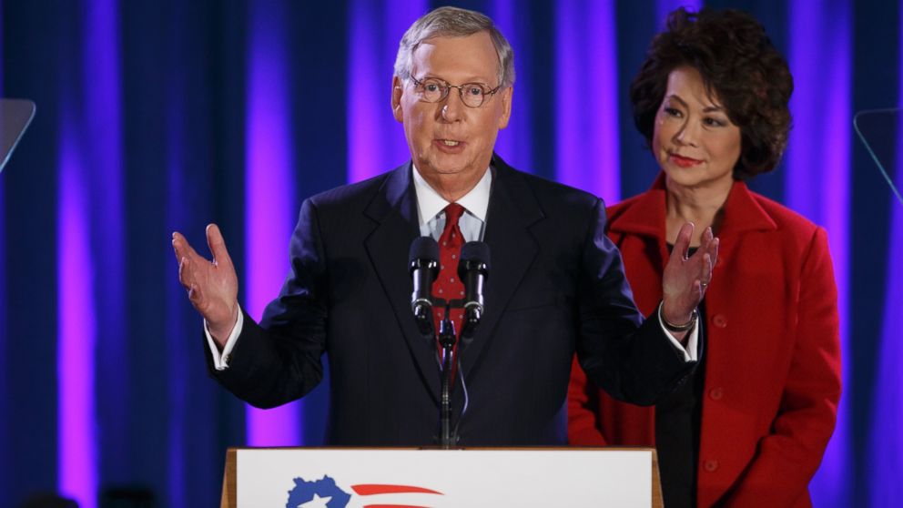 PHOTO: Senate Minority Leader Mitch McConnell of Ky., joined by his wife, former Labor Secretary Elaine Chao, celebrates with his supporters at an election night party in Louisville, Ky., Nov. 4, 2014.