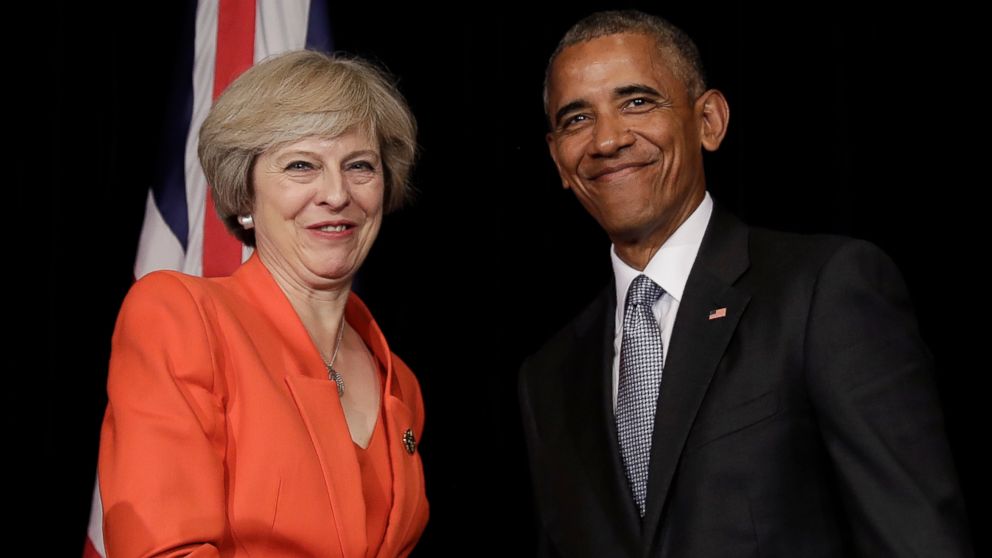 U.S. President Barack Obama and British Prime Minister Theresa May shake hands at the conclusion of a news conference after a bilateral meeting in Hangzhou in eastern China's Zhejiang province, Sunday, Sept. 4, 2016, alongside the G20.