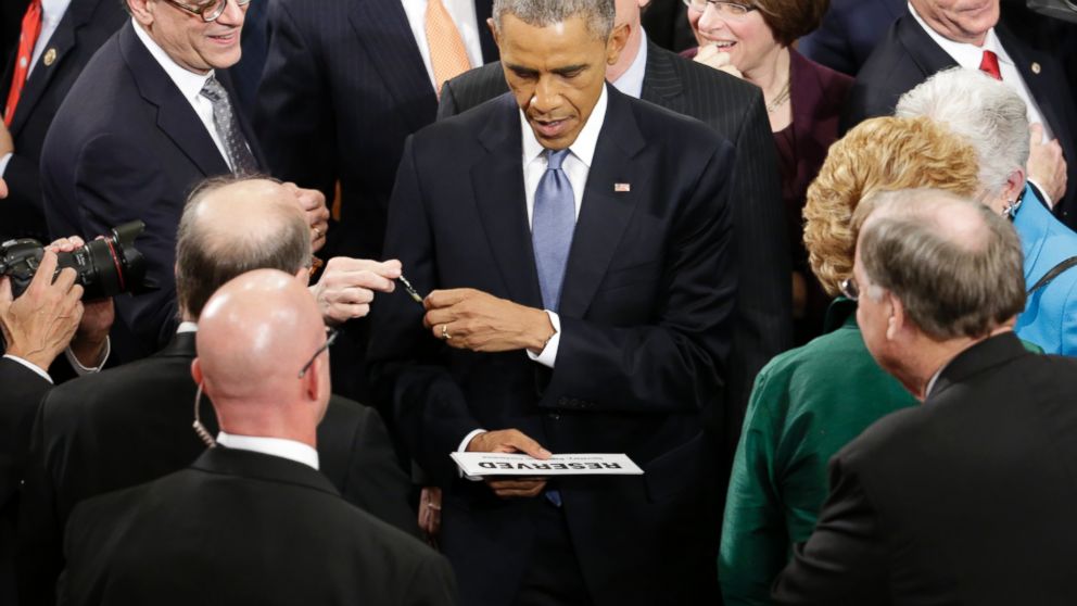 PHOTO: President Barack Obama prepares to sign an autograph on  Capitol Hill in Washington, Jan. 20, 2015, after giving his State of the Union address before a joint session of Congress.