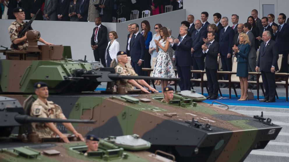 Tanks parade past President Donald Trump, first lady Melania Trump, French President Emmanuel Macron and his wife Brigitte Macron, during Bastille Day parade on the Champs Elysees avenue in Paris, Friday, July 14, 2017.