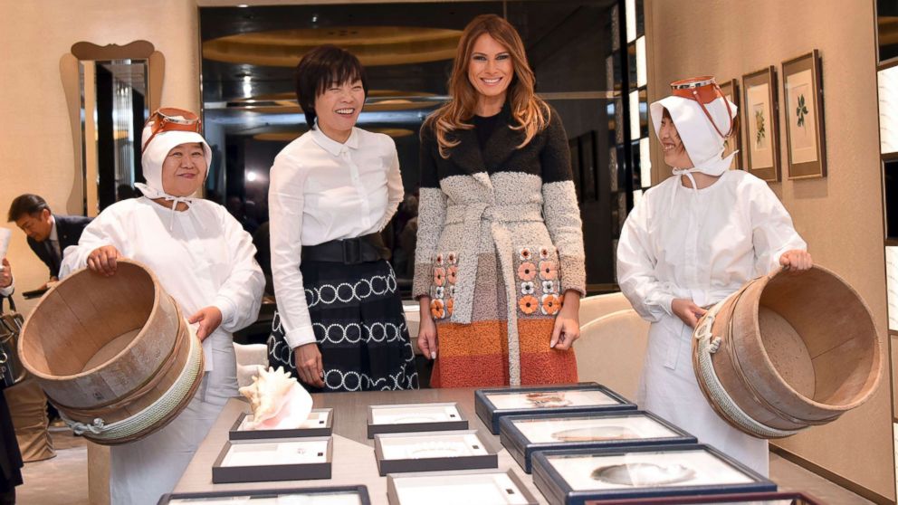 U.S. first lady Melania Trump and her Japanese counterpart Akie Abe, second from left, smile during their visit to Mikimoto Ginza Main Store, Japan's pearl jewelry maker, at Ginza shopping district in Tokyo Sunday, Nov. 5, 2017.