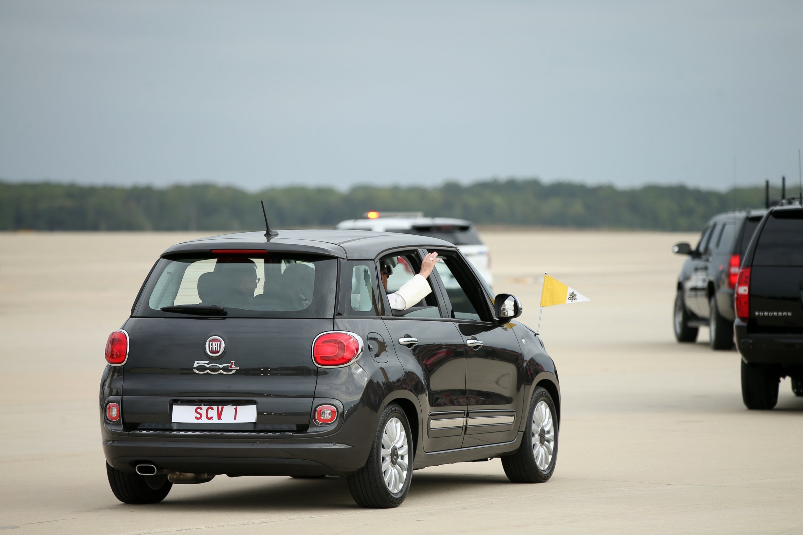 PHOTO: Pope Francis waves from a Fiat 500 as his motorcade departs from Andrews Air Force Base, Md., Sept. 22, 2015, where President and Mrs. Obama welcomed him.