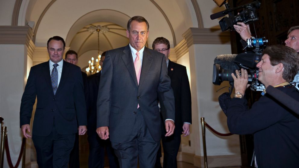 House Speaker John Boehner of Ohio departs the Capitol in Washington, Oct. 10, 2013, en route to the White House to meet with President Barack Obama about a solution to ending the government shutdown.