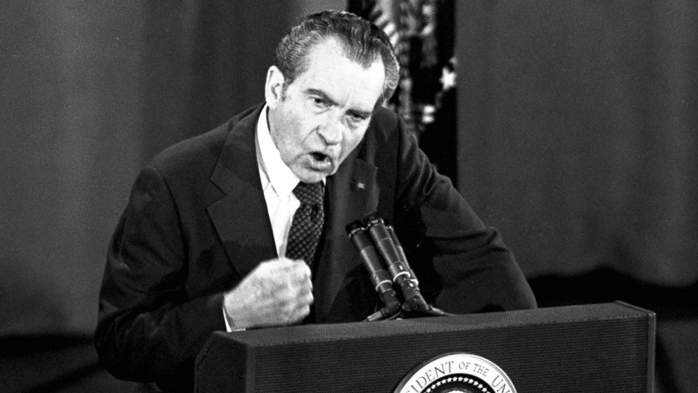 PHOTO: President Richard Nixon pounds his fist on the podium as he answers questions before members of the National Broadcasters Association in Houston, Texas, March 19, 1974.
