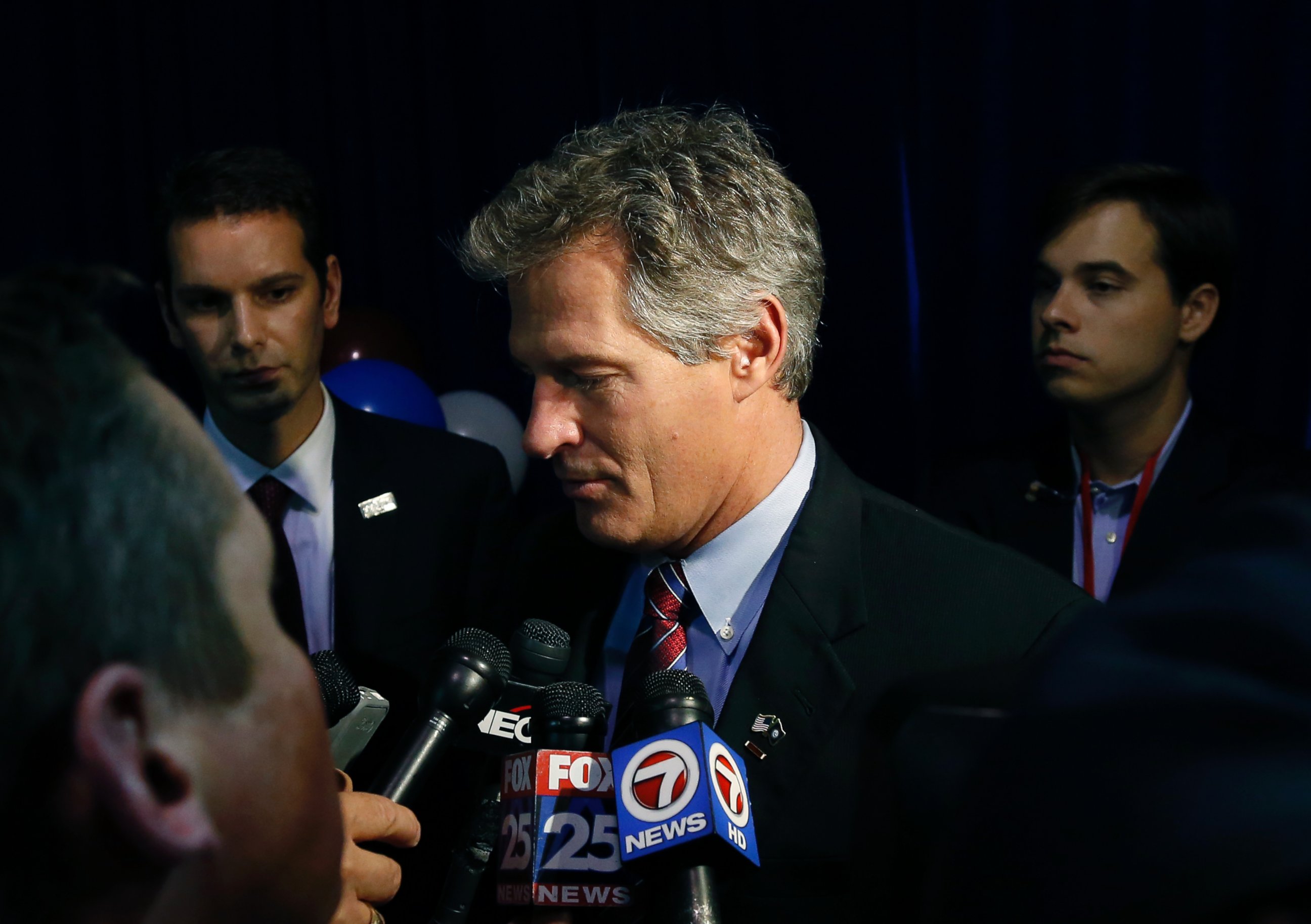 PHOTO: New Hampshire Republican Senate candidate Scott Brown speaks to reporters after conceding defeat to incumbent U.S. Sen. Jeanne Shaheen at his election night party in Manchester, N.H., Nov. 4, 2014.
