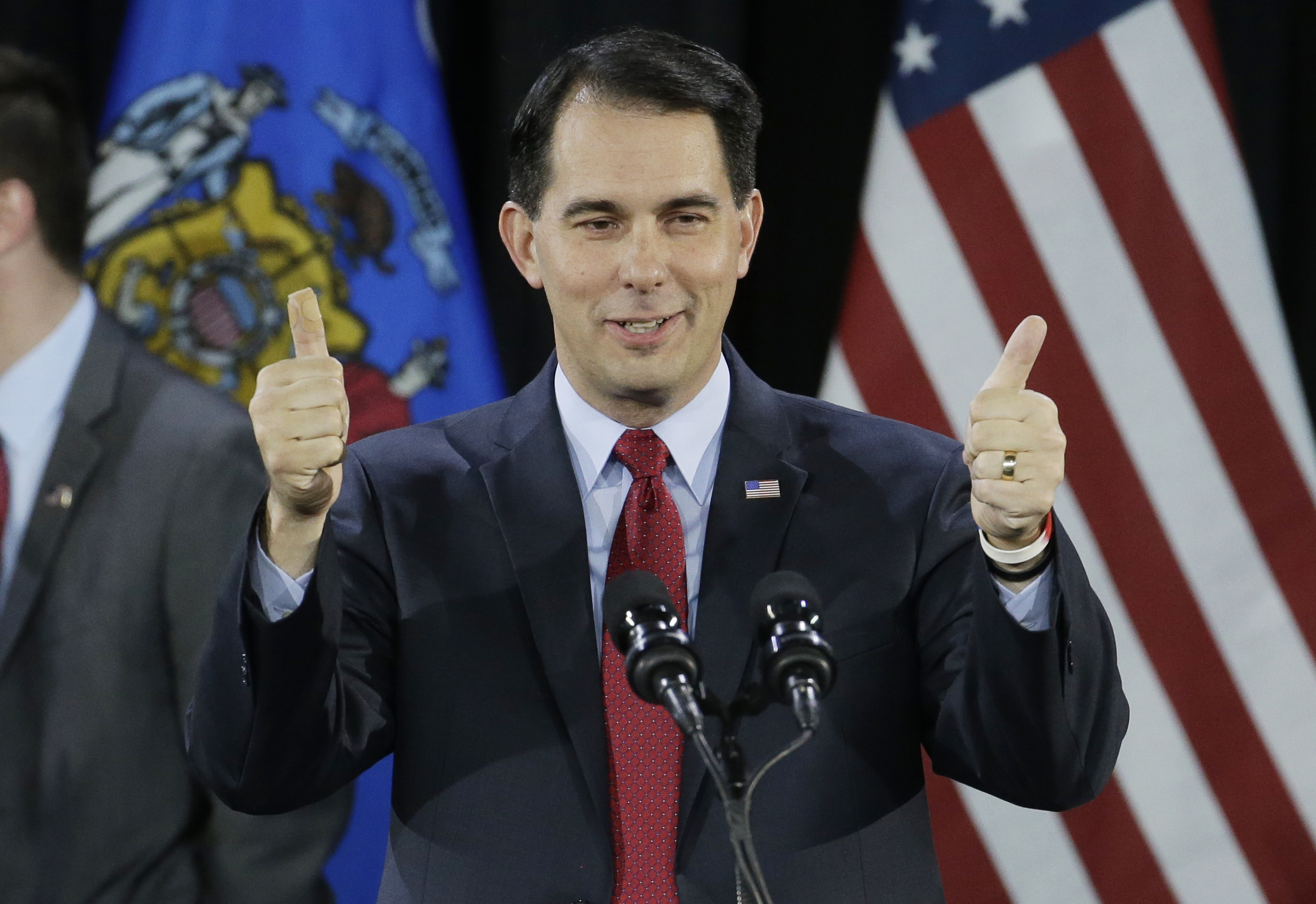PHOTO: Wisconsin Republican Gov. Scott Walker gives a thumbs up as he speaks at his campaign party, Nov. 4, 2014, in West Allis, Wis. Walker defeated Democratic gubernatorial challenger Mary Burke.