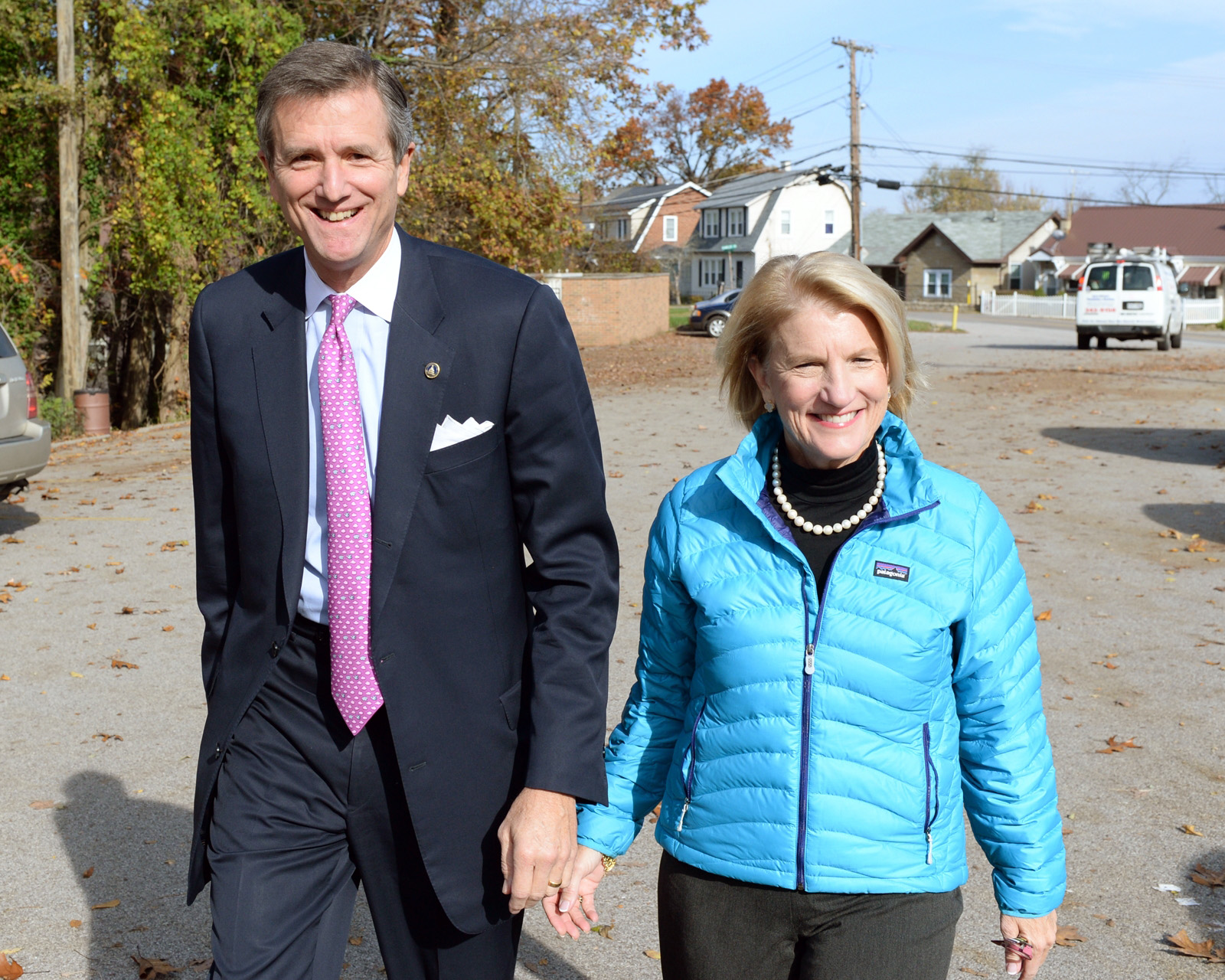 PHOTO: Shelley Moore Capito and her husband Charlie Capito head to their polling place to vote on Nov. 4, 2014 in the South Hills neighborhood of Charleston, W.Va.