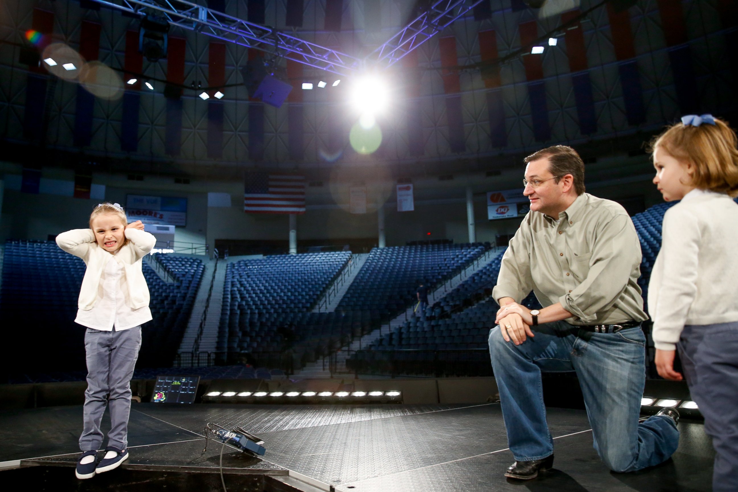 PHOTO: Caroline Cruz, 6, pretends to react to noise as Sen. Ted Cruz, R-Texas, tells her and her sister, Catherine, 4, how loud it will be for Cruz's Monday morning speech on stage at Liberty University on Sunday, March 22, 2015 in Lynchburg, Va.