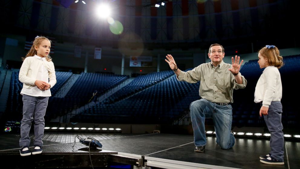 Sen. Ted Cruz, R-Texas, brings his daughters, Catherine, 4, right, and Caroline, 6, left, on stage during a walk-through, to tell them what to expect for Cruz's Monday morning speech where he is expected to launch his campaign for U.S. president, at Liberty University, Sunday, March 22, 2015, in Lynchburg, Va.