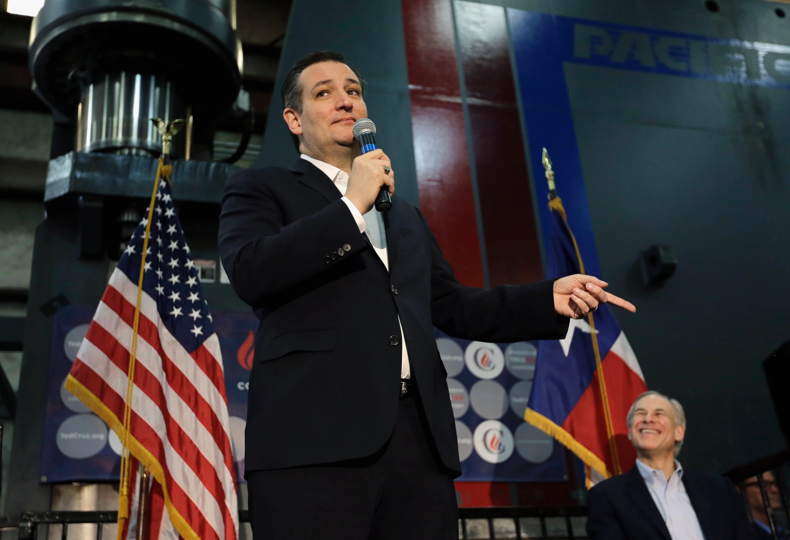 PHOTO: Republican presidential candidate Sen. Ted Cruz accompanied by Texas Gov. Greg Abbott speaks during a rally on Feb. 24, 2016, in Houston.