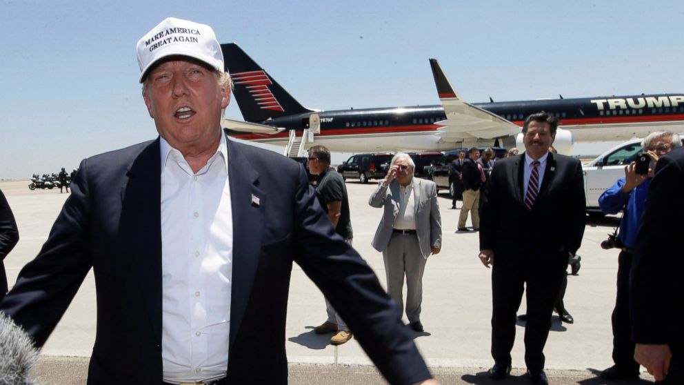 Republican presidential hopeful Donald Trump speaks after arriving at the airport for a visit to the U.S. Mexico border in Laredo, Texas, July 23, 2015. 