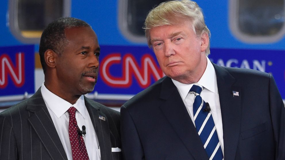 PHOTO: Republican presidential candidates Ben Carson, left, and Donald Trump talk before the start of the CNN Republican presidential debate at the Ronald Reagan Presidential Library and Museum, Sept. 16, 2015, in Simi Valley, Calif. 