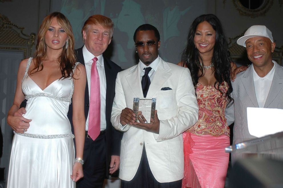 PHOTO: Donald and Melania Trump, Sean 'P Diddy' Combs, Kimora Lee Simmons and Russell Simmons at Russell Simmons 'Art For Life Palm Beach' Honoring Sean 'P Diddy' Combs at Mar-a-Lago on March 11, 2005 in Palm Beach, Florida.