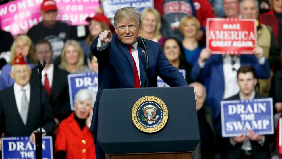 President Donald Trump reacts to the crowd while speaking at a campaign rally for Republican Rick Saccone in a hangar, Saturday, March 10, 2018, in Moon Township, Pa. Saccone is running against Democrat Conor Lamb in a special election being held on March 13 for the Pennsylvania 18th Congressional District vacated by Republican Tim Murphy.