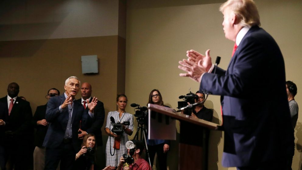 Miami-based Univision anchor Jorge Ramos, left, asks Republican presidential candidate Donald Trump a question about his immigration proposal during a news conference, Tuesday, Aug. 25, 2015, in Dubuque, Iowa.