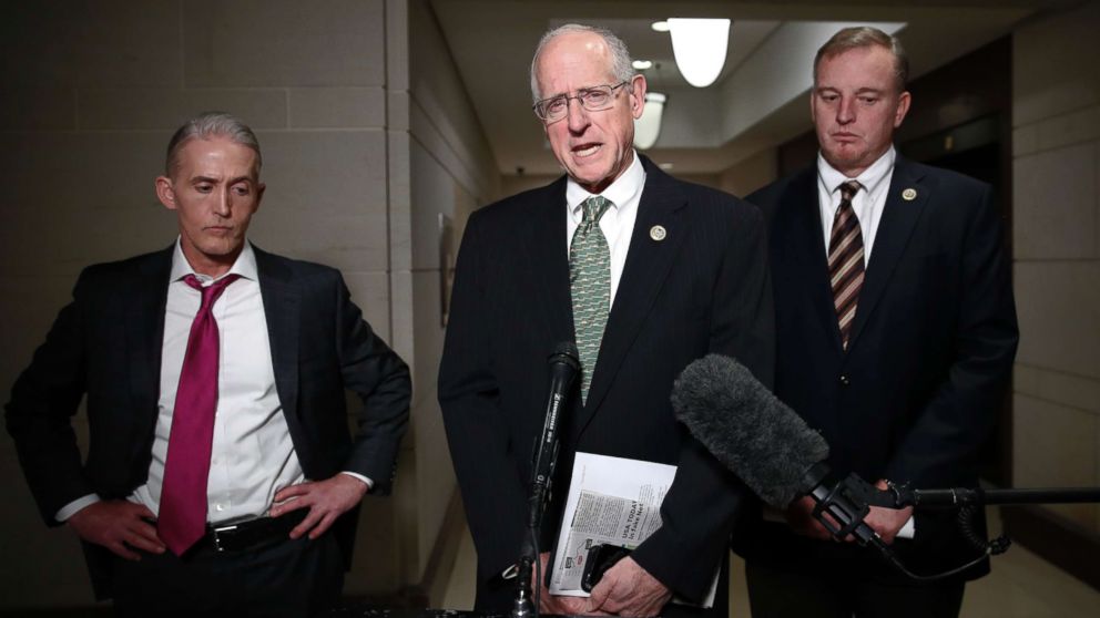 House Intelligence Committee member Rep. Mike Conaway, R-Texas, center, joined by Rep. Tom Rooney, R-Fla., right, and Rep. Trey Gowdy, R-S.C., left, speaks to media after House Intelligence Committee meeting where Donald Trump Jr., was interviewed on Capitol Hill in Washington, Wednesday, Dec. 6, 2017.