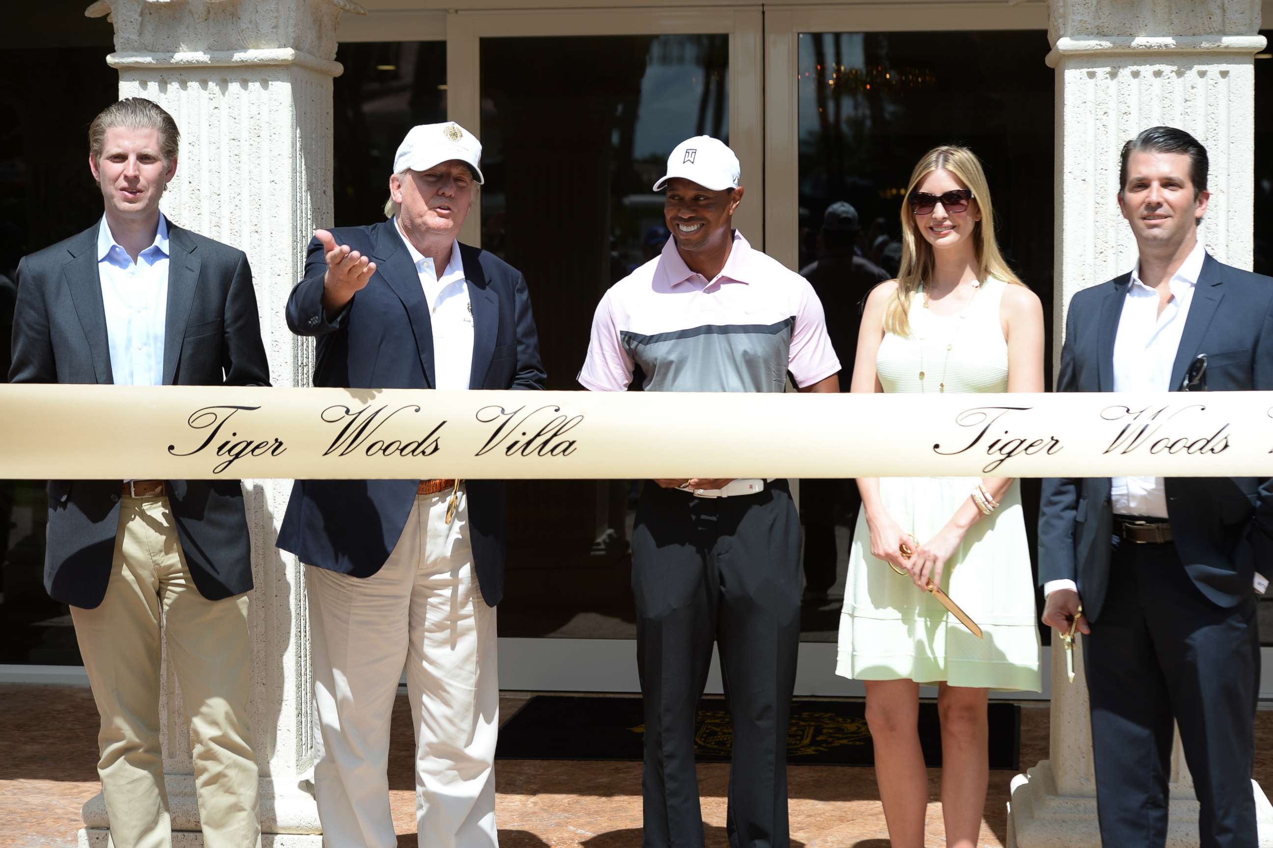 PHOTO: Eric Trump, Donald Trump, Tiger Woods, Ivanka Trump and Donald Trump Jr. at the Tiger Woods Villa prior to the start of the World Golf Championships-Cadillac Championship at Trump National Doral on March 5, 2014 in Doral, Florida. 