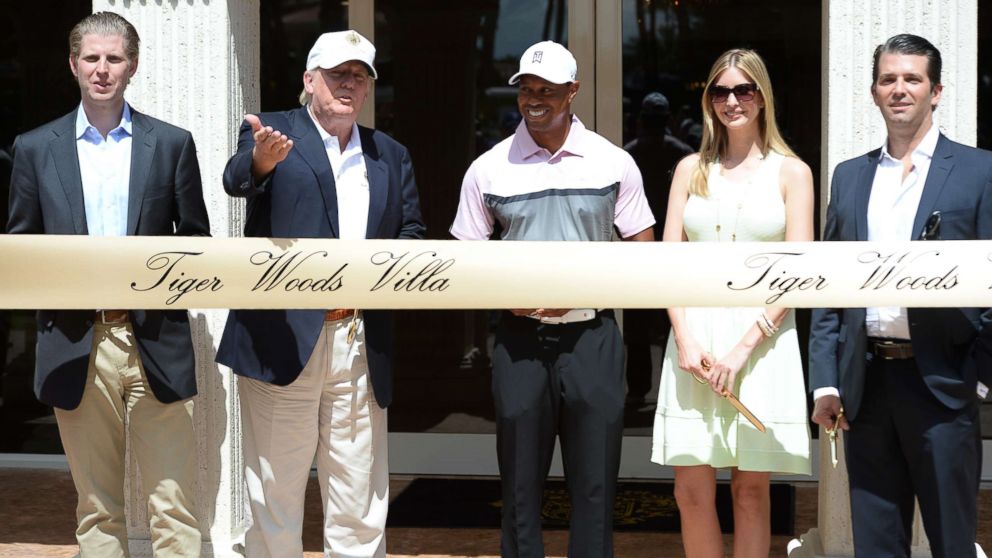 PHOTO: Eric Trump, Donald Trump, Tiger Woods, Ivanka Trump and Donald Trump Jr. at the Tiger Woods Villa prior to the start of the World Golf Championships-Cadillac Championship at Trump National Doral on March 5, 2014 in Doral, Florida. 