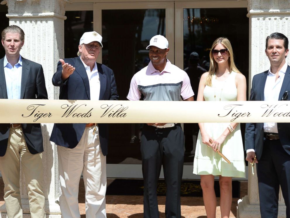PHOTO: Eric Trump, Donald Trump, Tiger Woods, Ivanka Trump and Donald Trump Jr. at the Tiger Woods Villa prior to the start of the World Golf Championships-Cadillac Championship at Trump National Doral on March 5, 2014 in Doral, Florida.