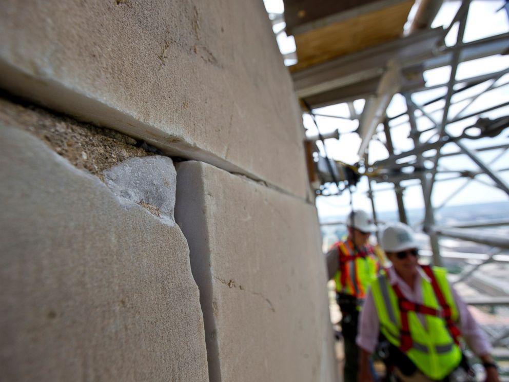 PHOTO: This June 2, 2013 file photo shows a damaged stone on the Washington Monument in Washington, DC.