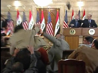 President Bush attacked with shoe